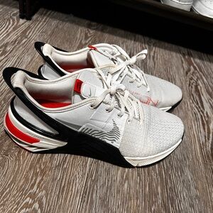 Nike White and Black Athletic Shoes with Red Accents